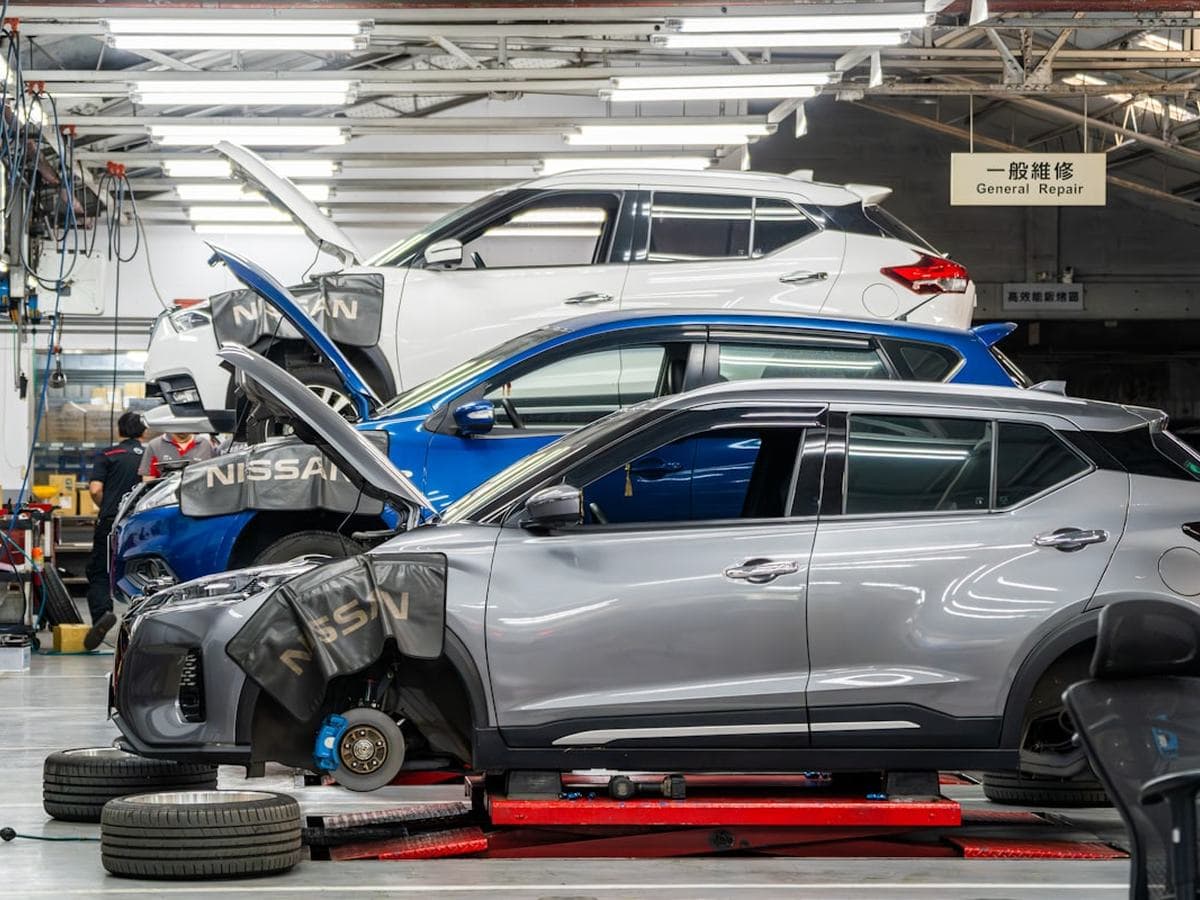 Accident-damaged car stripped down in the repair bay