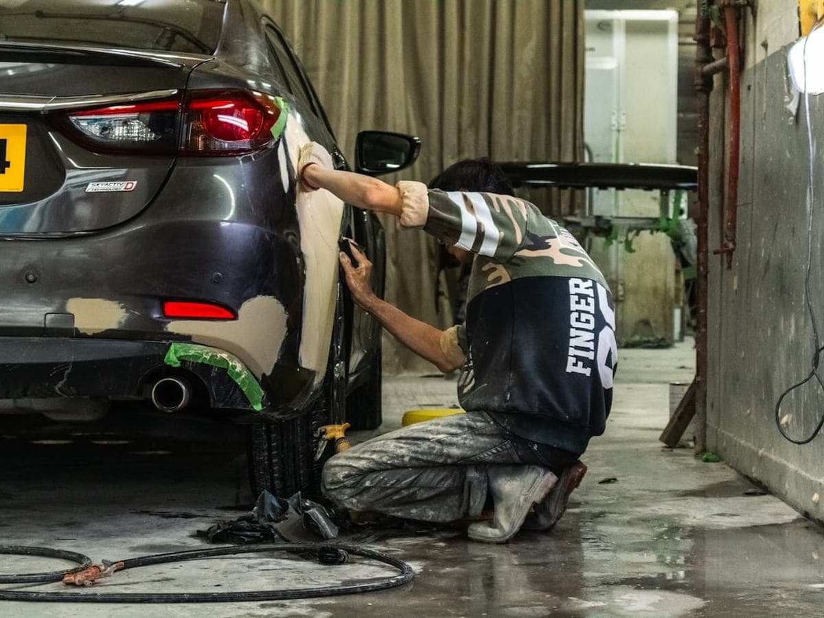 Rear quarter panel being sanded back
